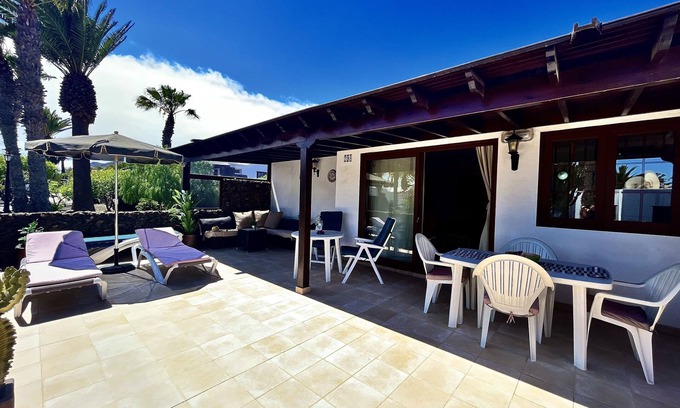 Playa Blanca Villa | Modern villa, shared pool, free WiFi, 100m to the sea, shops and restaurants.