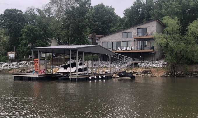 Afton House | Modern waterfront home on Monkey Island with dock