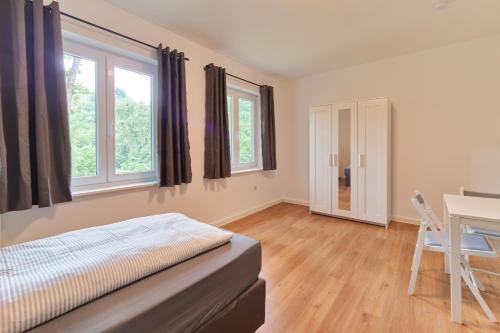 Ehrang-Quint Apartment | Monteurwohnungen in Trier - Parkplatz - Einzelbetten - Waschmaschine und Trockner