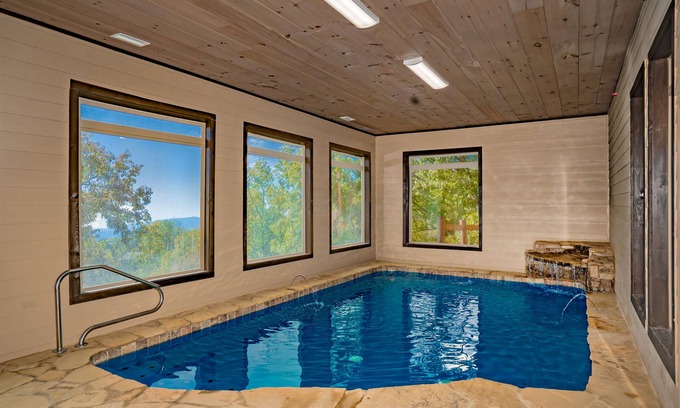 Sevierville Cabin | Mountain Castle: VIEWS, Indoor Pool, Home Theater, Top Amenities, near Attractions!