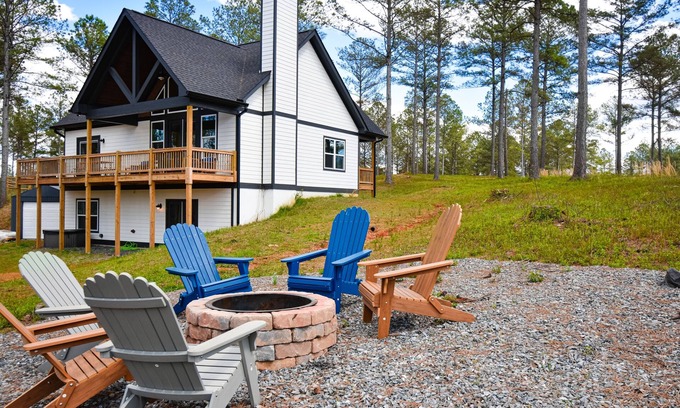 Ellijay House | Mountain view home with wood fireplace, hot tub, game tables, firepit, & AC