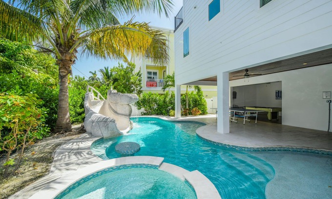 Bradenton Beach House | Multi family beach house! 9 bedrooms, pool with waterslide + rooftop deck