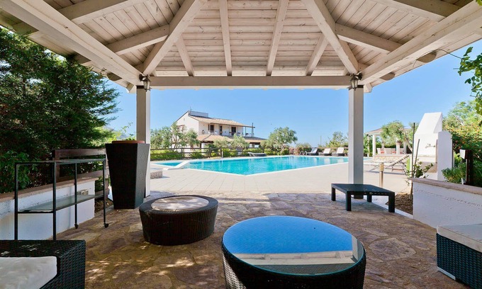 Castellammare del Golfo Villa | My Rental Homes - Villa Ophelia, surrounded by lush vegetation with swimming pool