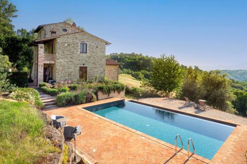 Fratticiola Selvatica Apartment | Nature's Haven Apartments in Renovated Farmhouse with Pool