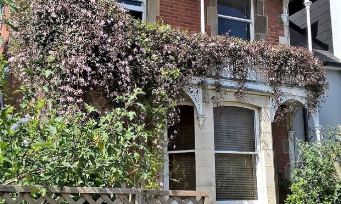 Swanage Apartment | Nestleton: Breakfast on the balcony or snuggle around the fire-dogs welcome too