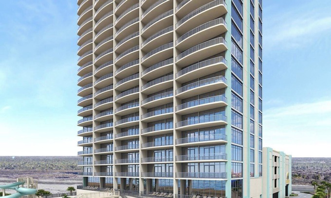 Gulf Shores Condo | New Complex! BeachFront! Lazy River-Waterslide-Hot Tub Price Drop Thru December