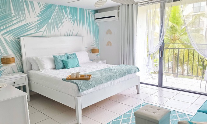 Yeoman Wood Apartment | NEW Fresh Lagoon Blue Beachfront Studio at Coral Beach Hotel, Grand Bahama