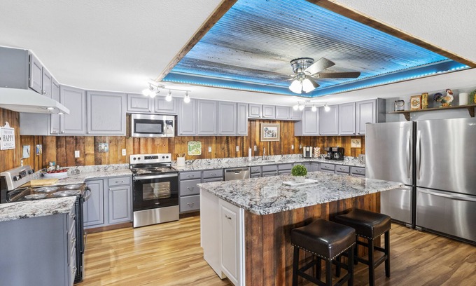 Sunrise Beach House | New! Lakefront 8 Bedroom Family Entertainer! Boat Dock, Hot Tub, Fire Pit, Wi-Fi