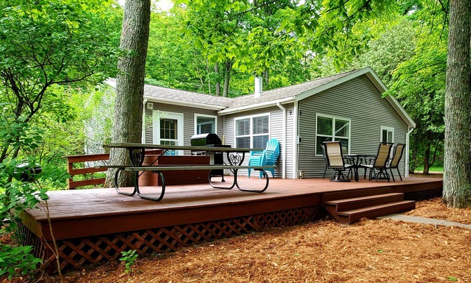 Traverse City Cottage | New Listing! 3br cottage on Lake Leelanau with beach, boat launch, playground!