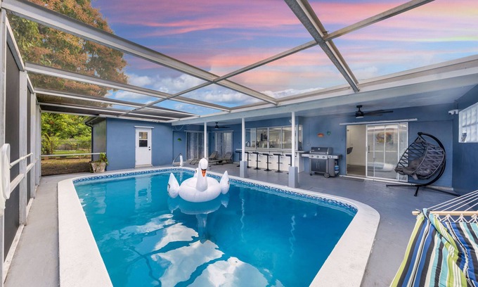 Miramar Villa | New Modern Retreat with King Bed/Heated Pool/Grill/only 8 miles to Beach!