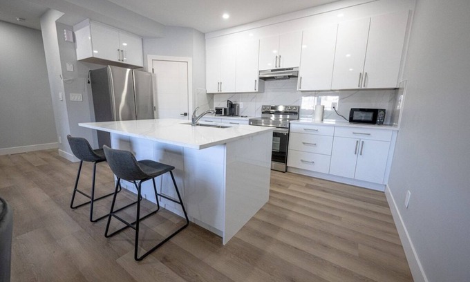 Grande Prairie House | New Modern Townhome | Stocked Kitchen | Free WiFi