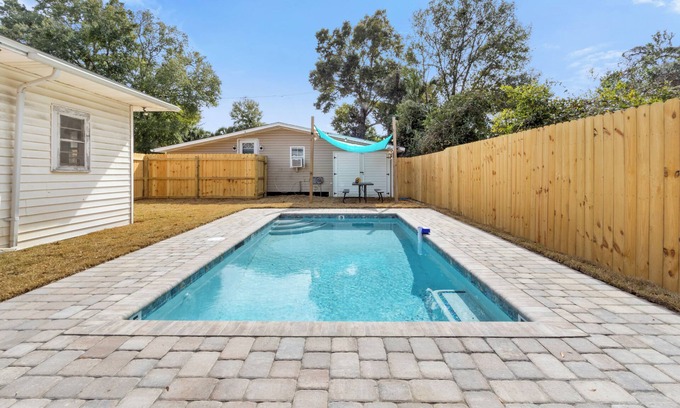 East Pensacola Heights House | NEW POOL NOW AVAILABLE FOR USE! Unit was meticulously furnished to give a coastal/farm house vibe