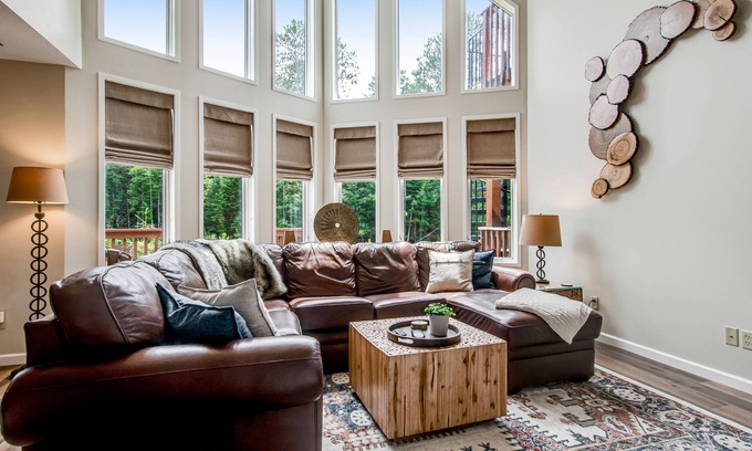 Eagle River Condo | Newly-built condo on Duck Lake with decks, private dock, & firepit