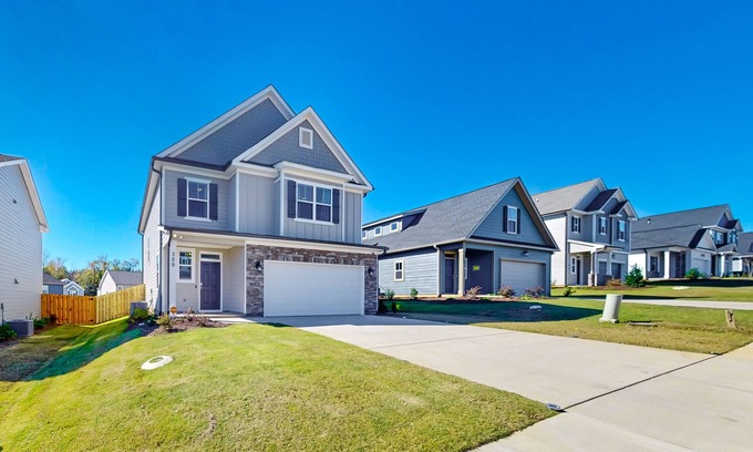 Grovetown House | Newly constructed home in a quiet neighborhood with yard, modern interior, & W/D