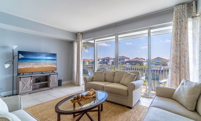 Ruskin Condo | Newly Listed 3 bedroom Little Harbor End Unit | Stunning canal views from the living room & master!