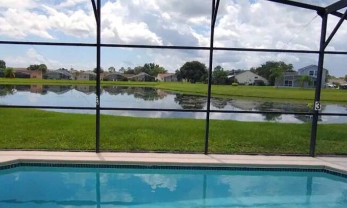 Crescent Lakes House | Newly renovated Lakefront Villa with private heated pool!