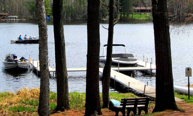 Eagle River Condo | Newly Updated! 2 BD 2BA Voyageur Lake Condo w/Private Pier. End Unit. ER Chain
