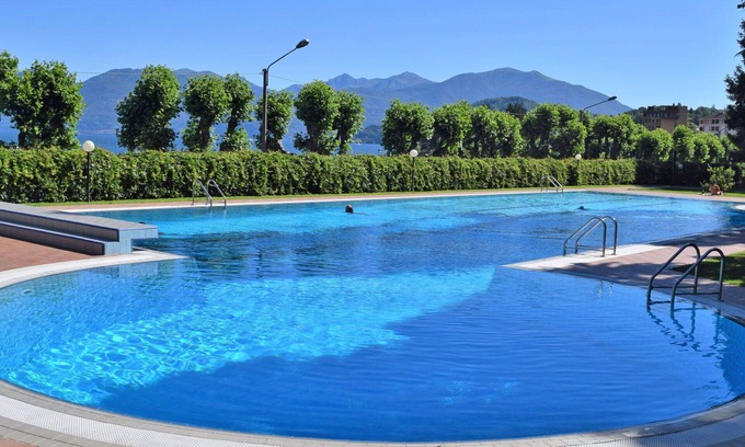 Porto Valtravaglia Apartment | Nice apartment for 5 people with pool, WIFI, TV and balcony