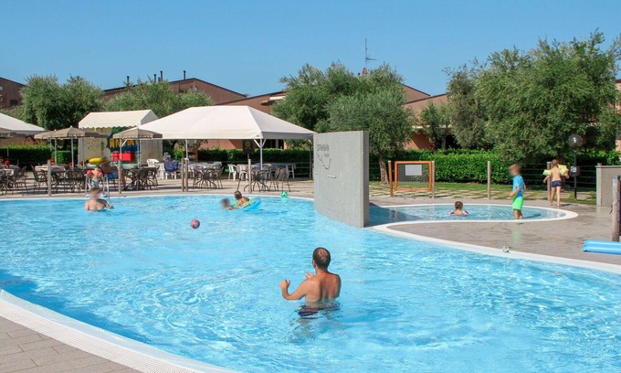 Solarolo Apartment | Nice apartment for 4 guests with A/C, WIFI, pool, TV, balcony and pets allowed