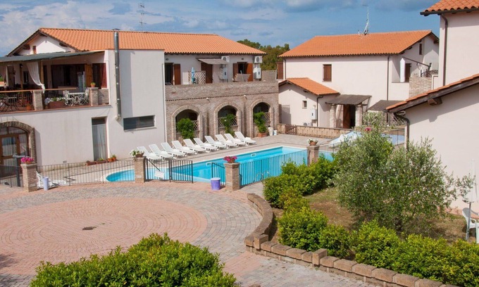 Follonica Apartment | Nice apartment for 4 guests with pool, A/C, TV, patio and pets allowed