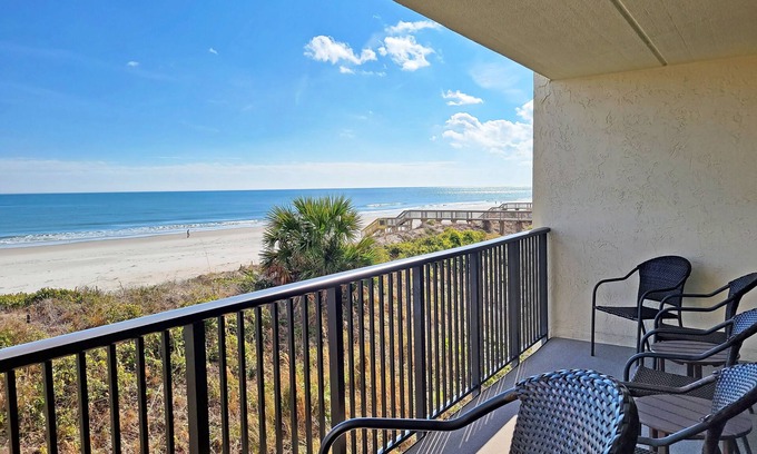 Litchfield by the Sea Condo | Oceanfront 2-story condo, main floor balcony view, direct beach access, pool