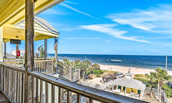 New Smyrna Beach Condo | Oceanfront condo with pool, balcony, ocean views, W/D, & central AC