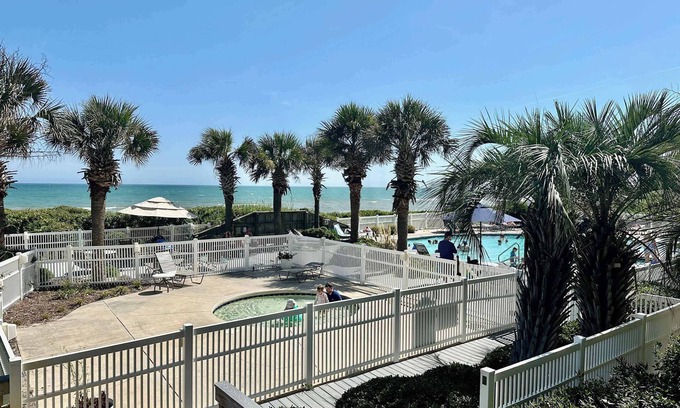 Crystal Coast Condo | Oceanfront Condo – Steps to Sand, Heated Pools & More! - Ocean Club Belles Vacat