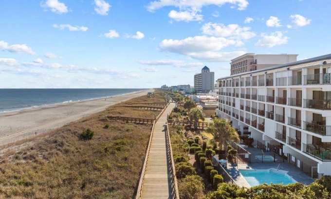 Carolina Beach Condo | Oceanfront condo: pool, free parking & elevator on the Carolina Beach Boardwalk!