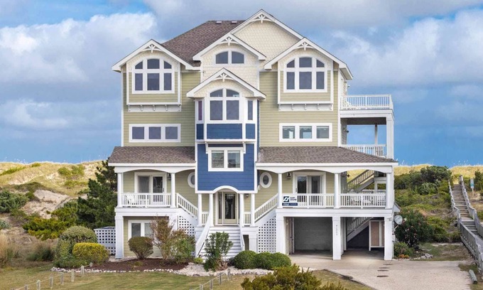 Ocean Isle Estates House | Oceanfront Home with Hot Tub, Pool, Putting Green, Elevator, and Game Room