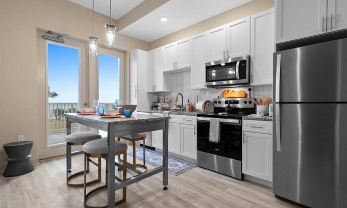 Seabreeze Park Condo | Oceanfront Oasis Daytona Beach 1BR/1BA - Parking Lot View - 214