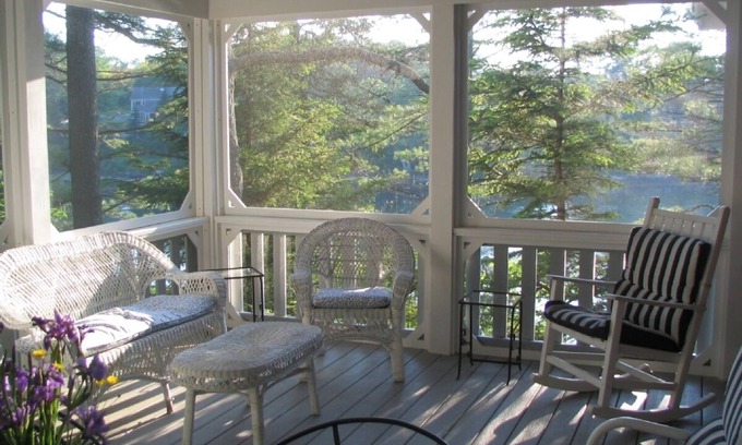 Boothbay Harbor Cottage | Oceanfront Juniper Point Cottage with dock, screened porch, close boat traffic