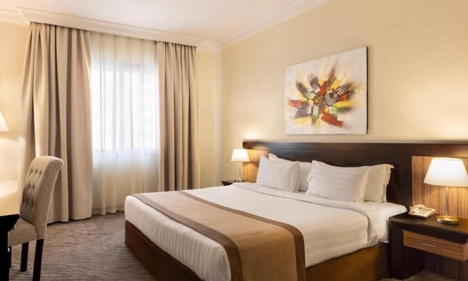 Al Muraqqabat House | One Bedroom Apartment Near Al Shamsi Building By Luxury Bookings