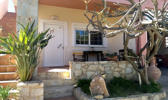 Kato Stalos Condo | One bedroom apartment with large garden, in quiet location, 10 min walk to beach