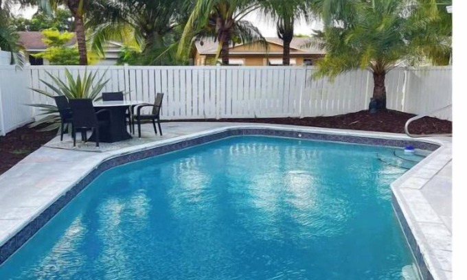Palm Aire Village West House | Open concept 4 BR with heated pool and lounge area