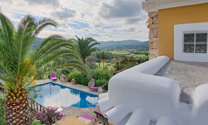 Sant Miquel de Balasant Villa | Original restored stone-wood ibizan country villa with pool facing sunset.