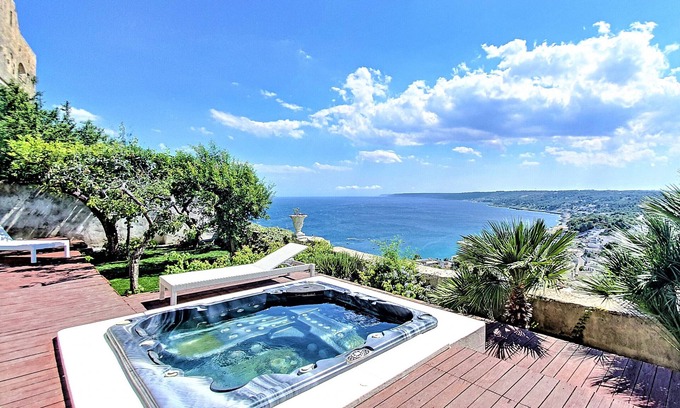 Castro Marina Ski Chalet | Outdoor jacuzzi in old town w/fantastic sea view