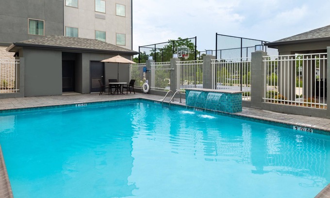 Lake Charles Condo | Outdoor Pool. Free Breakfast. Perfect for Your Next Stay!
