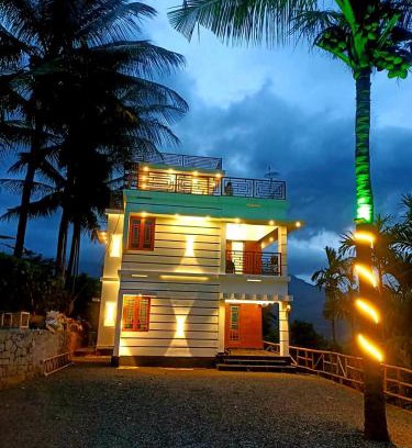 Kanthalloor Villa | Palm view 2