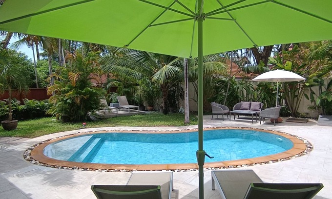 Rawai Villa | Paradise Island Villa 3 features a private swimming pool in a luxurious tropical park.
