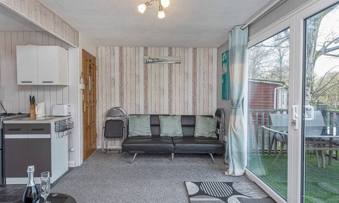 Bont Newydd House | Pass the Keys | Cosy Chalet at Lakeside Glan Gwna Holiday Park