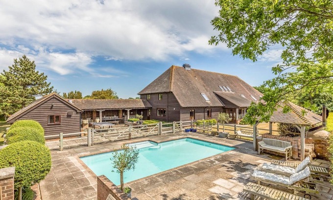 Sidlesham House | Pass the Keys | Large Converted Barn With Pool, Gym and Gardens