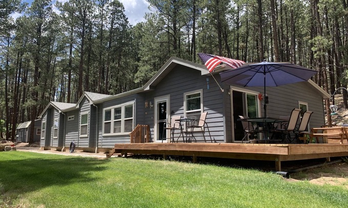 Forest Lakes House | Peace and privacy await among the towering Pine Trees.