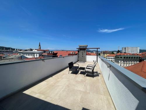 Klagenfurt am Woerthersee Apartment | Penthouse mit Außendusche