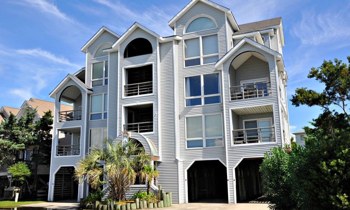 Ocracoke Condo | Pirate's Quay 1 North: Enjoy watching the ferries in Silver Lake Harbor