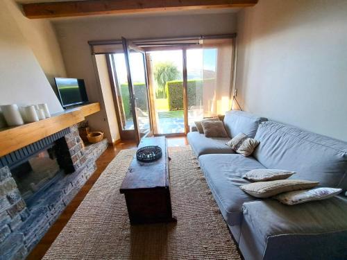 Olopte Apartment | Planta baja con jardín y piscina en Olopte