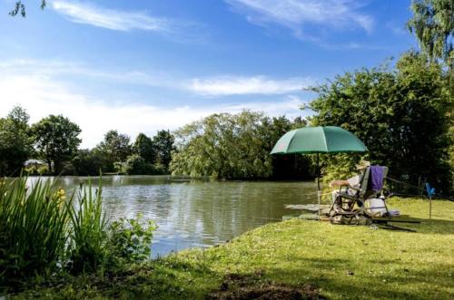 Saxmundham House | Platinum lakeside Lodge on resort with fishing