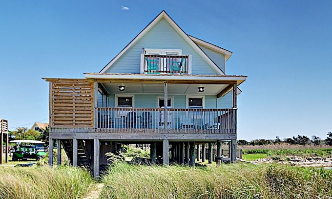 Ocracoke House | Point Of View: Relax on the deck watching passing boats and kayaks.