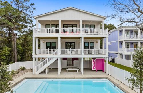 Long Beach House | Pomegranate 8 bedroom, 6 full and 2 half bathroom custom-built home with a private heated pool!