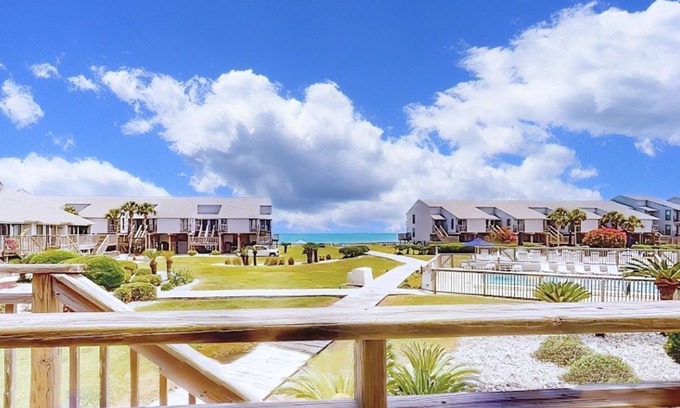 East End House | Poolside dog-friendly townhouse with partial Gulf views, on-site pool & grills