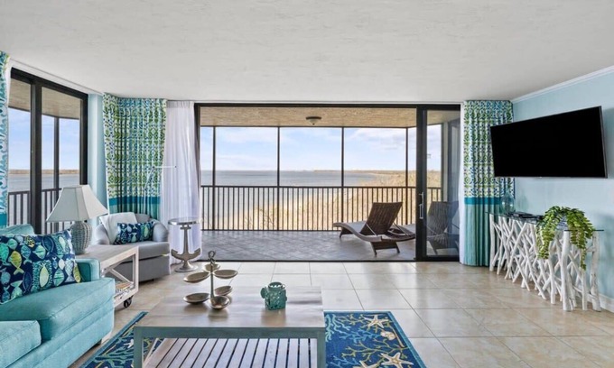 Punta Rassa Condo | Pristine Waterfront Residence with Panoramic Water Views - Pool Open!